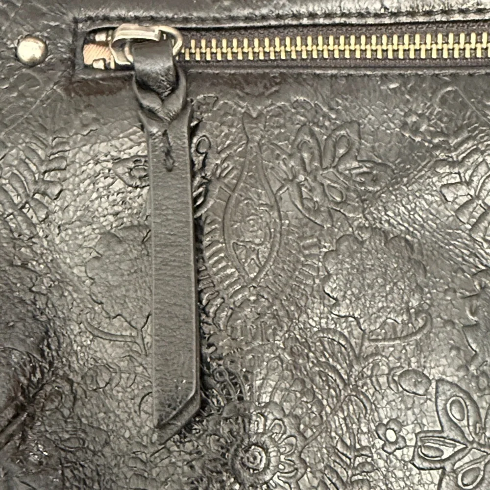 The Sak Black Oleta Leather Embossed Adjustable Crossbody Bag EUC